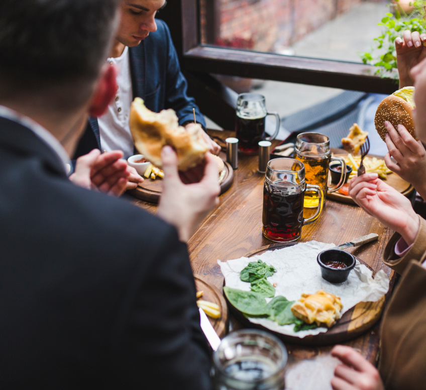 friends-eating-conversating-restaurant_new